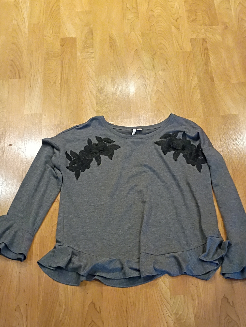 LC Lauren Conrad Gray Ruffle-Hem Sweatshirt with Black Floral Appliqué